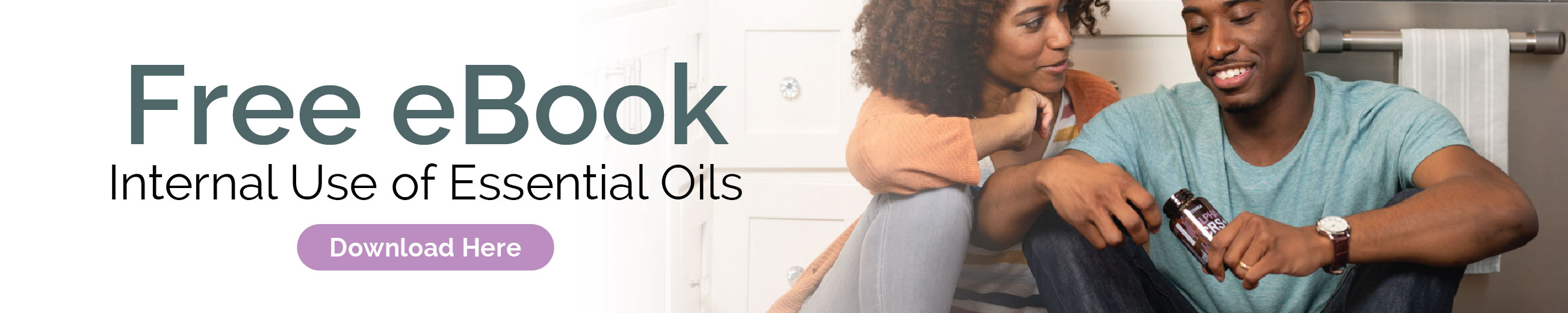 Person placing oil drops into essential oil diffuser. Get a free eBook, Aromatic Use of Essential Oils. Click here to download.