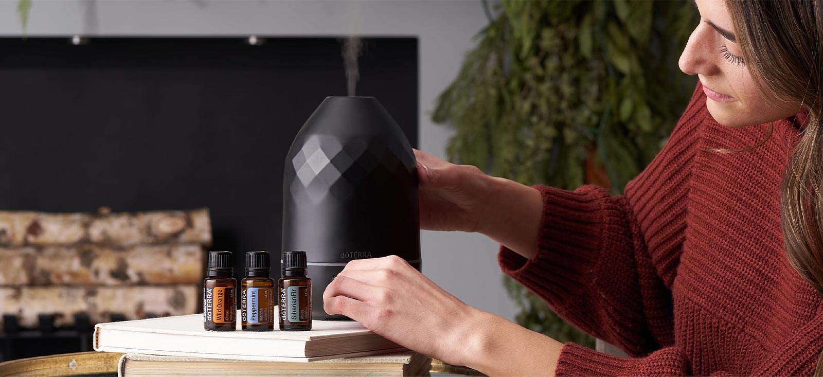 Woman using a diffuser