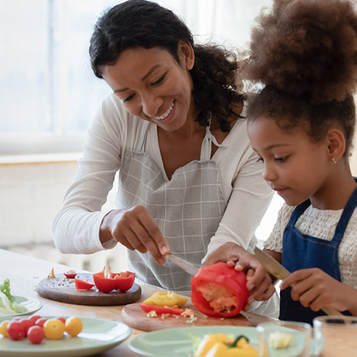 A mother and daughter eating together