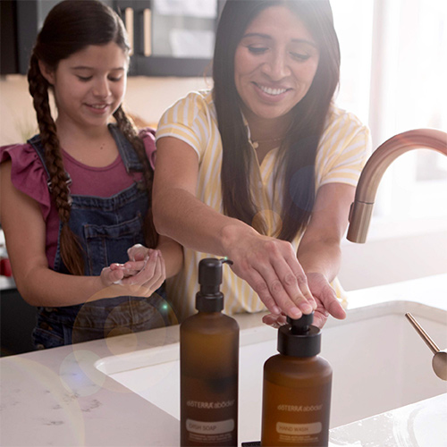 Woman using Abode cleaning with her daughter