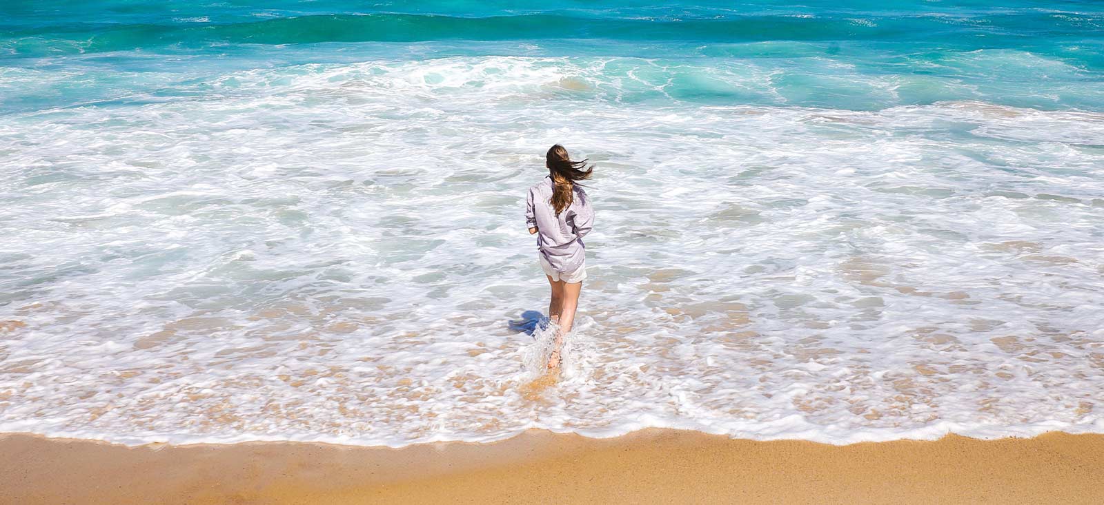 woman walking on the beach