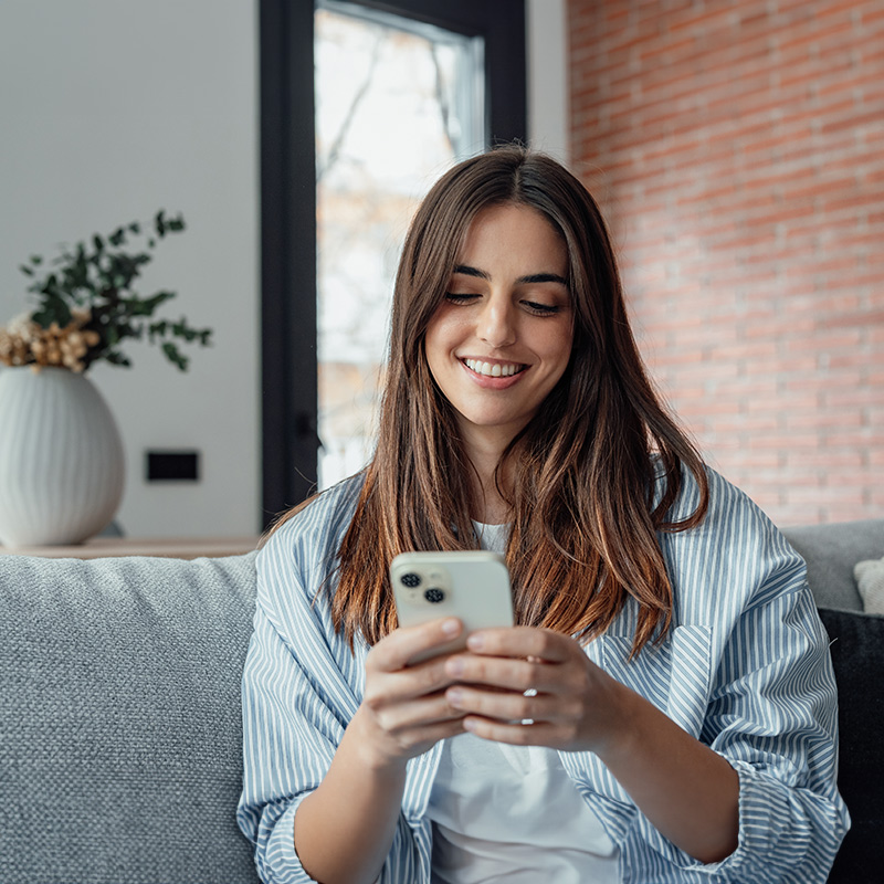 Woman looking at her phone.