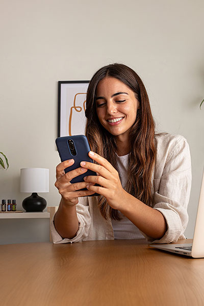 A woman looking at her phone