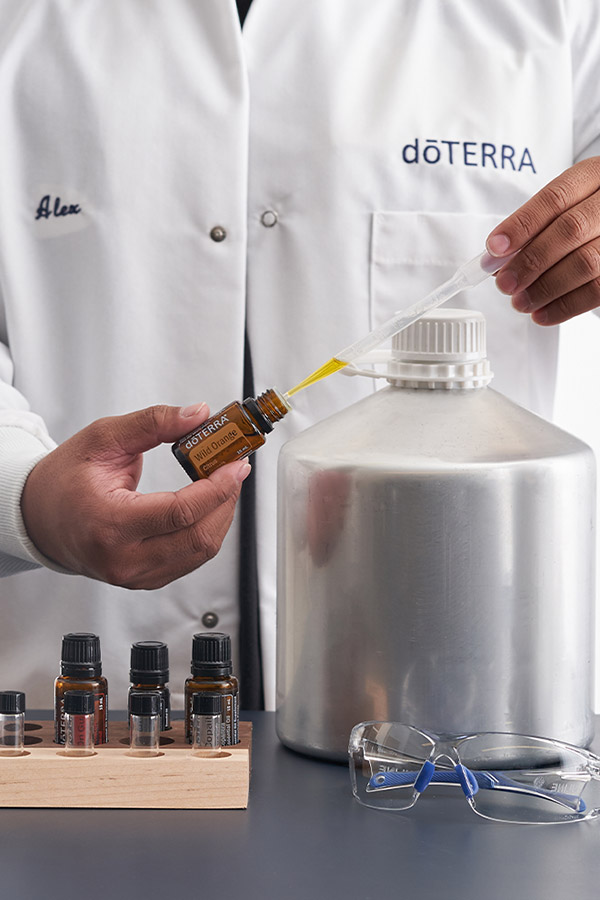 A scientist testing essential oil purity