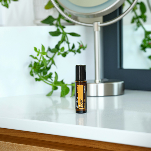 Hope Essential Oil over a counter top with a mirror