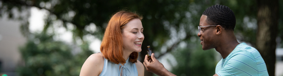 Two women sharing oils