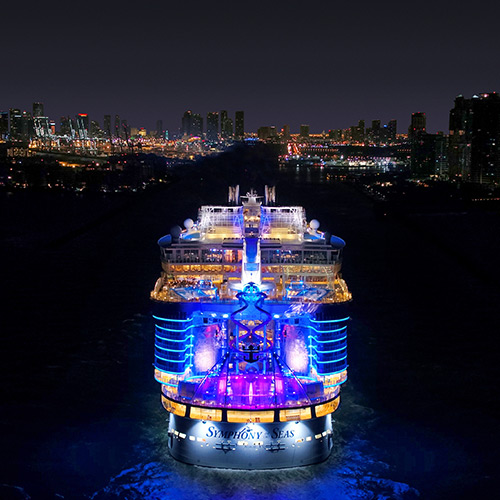 The cruise ship called Symphony of the Seas, shown sailing at night