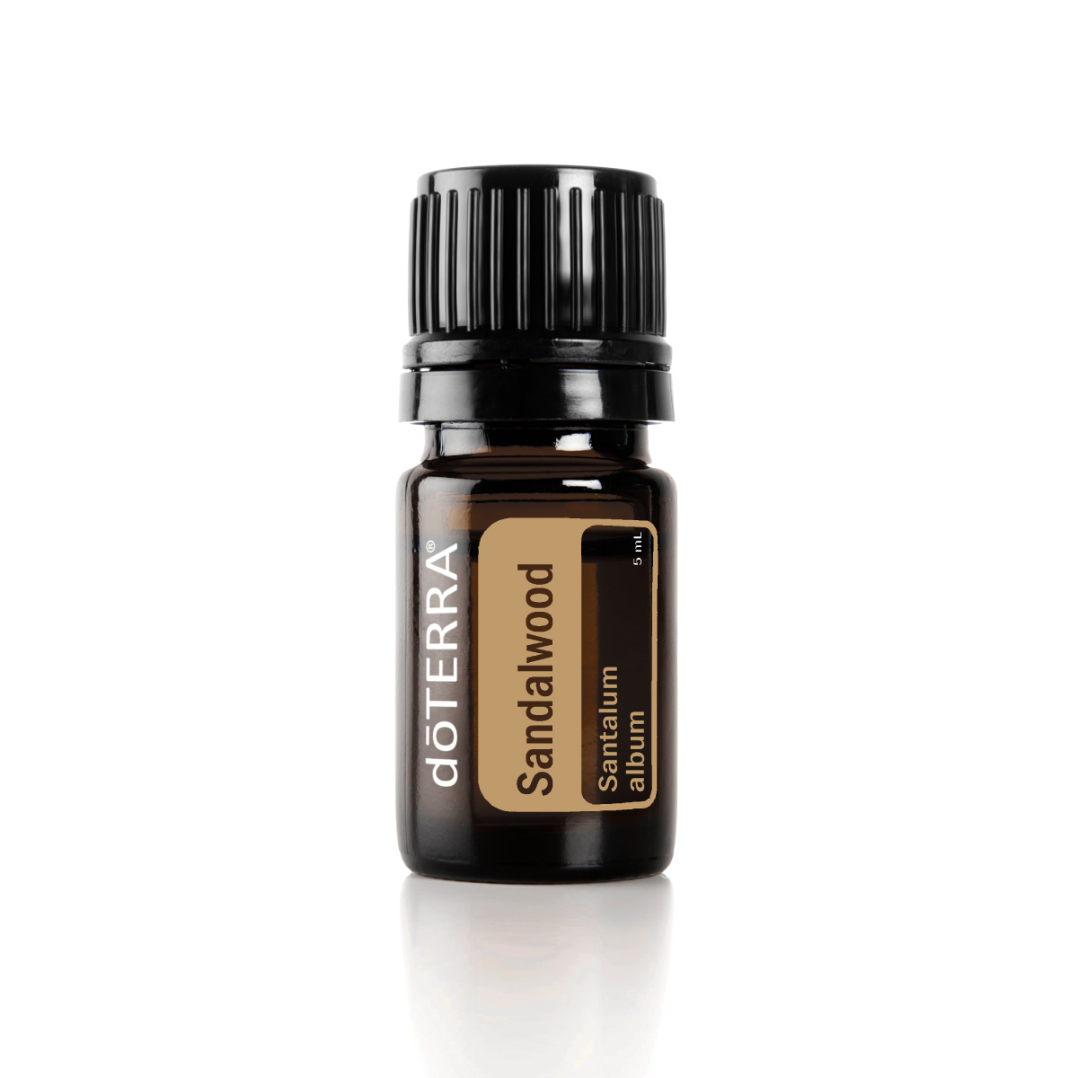 Bottle of doTERRA Sandalwood oil. What is Sandalwood oil good for? Sandalwood essential oil can be used to soothe the skin and create a grounding atmosphere during meditation.